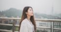 Photo of woman with eyes closed by sean Kong on Unsplash